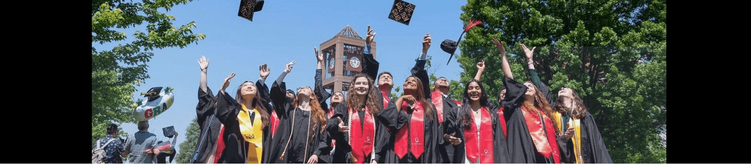 An image of QC students at their graduation ceremony.